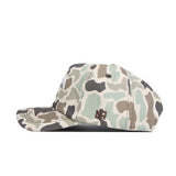 The No Rivals SMU Huntsman Hat is a 5-panel Duck Camo hat in green, beige, and brown with an MR logo embroidered in brown near the back and a classic snapback closure for an adjustable fit.