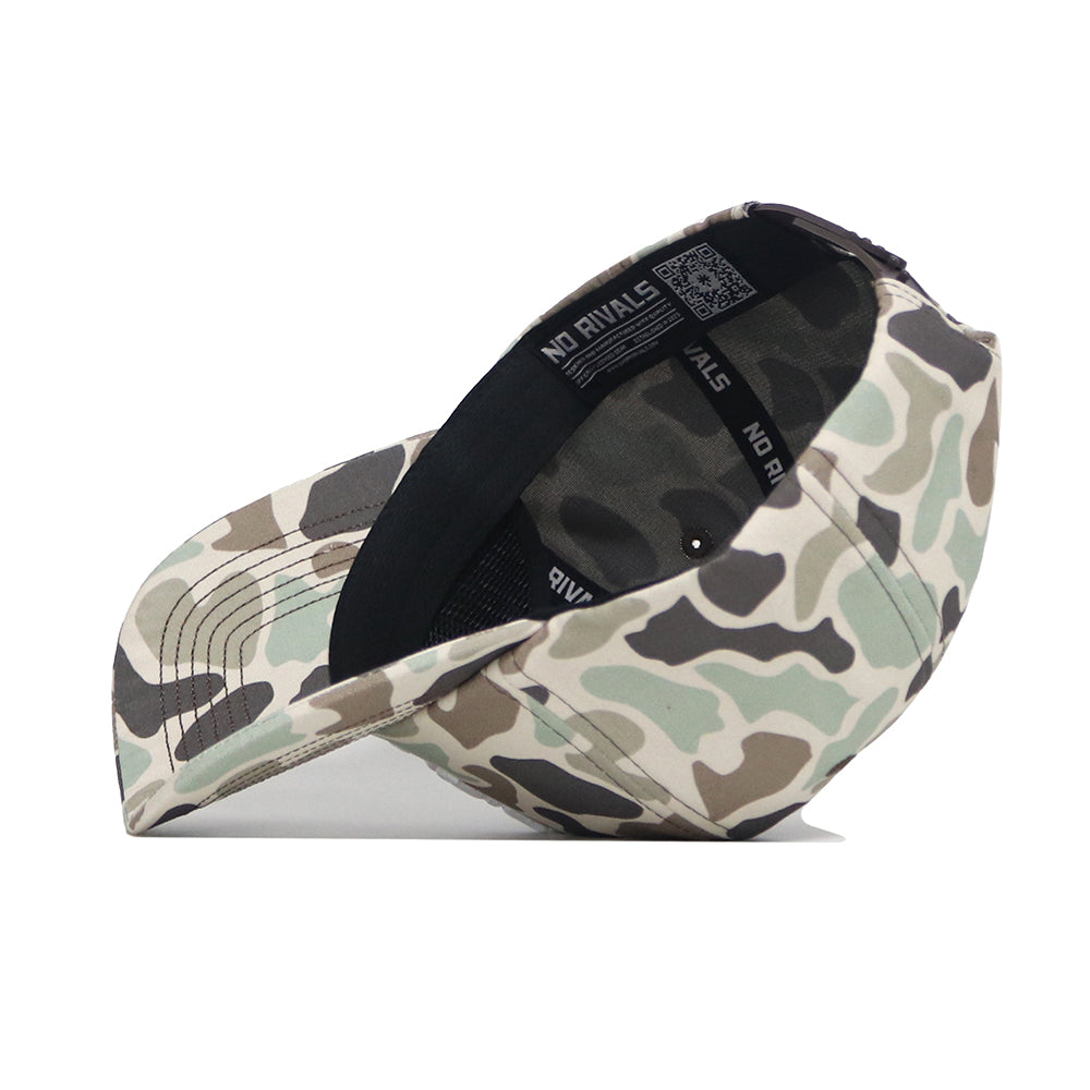 The Texas A&M Huntsman Hat by No Rivals is shown upside down, revealing its black inner band and NO RIVALS text inside. This green, brown, and beige 5-panel snapback adds style and comfort to any outfit.