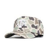 The No Rivals Texas A&M Huntsman Hat is a 5-panel duck camo cap with a white embroidered Texas A&M ATM logo, curved brim, and adjustable snapback strap.