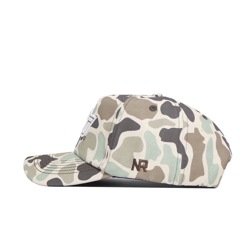 The Oklahoma State Huntsman Hat by No Rivals is a 5-panel snapback in green, beige, and brown duck camo. It features brown embroidered NR letters on the side and is shown with the bill facing left.