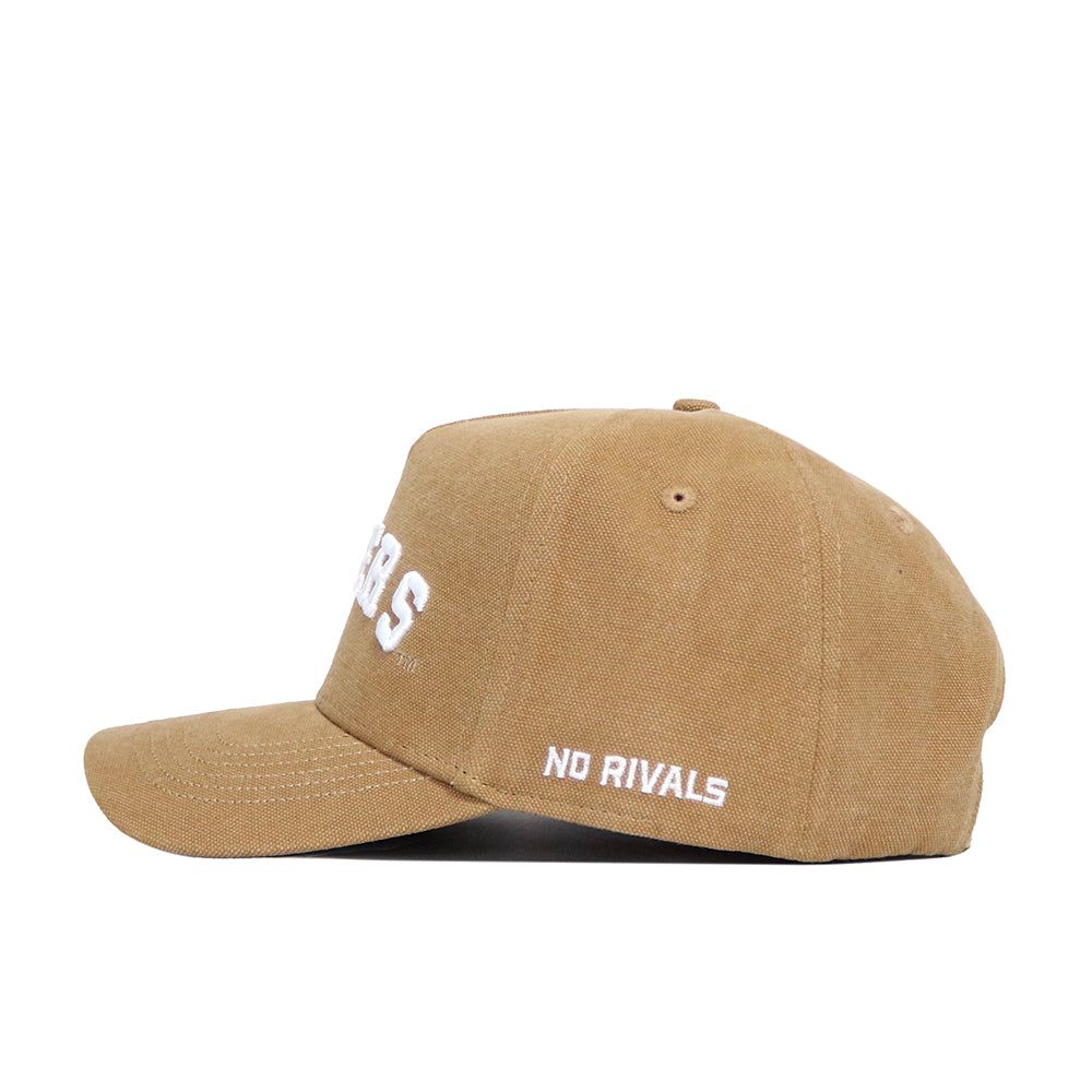 The No Rivals LSU Rustic Hat is a brown cotton canvas hat with a structured fit. Viewed from the side, it shows white "NO RIVALS" embroidery near the back and partially visible white text on the front.