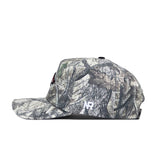 Side view of the No Rivals Arkansas Outland Hat, a structured fit baseball cap with grey and green camo, small white NP embroidery on the side, and made from high-quality cotton for lasting durability.