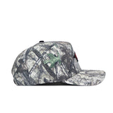 The No Rivals Arkansas Outland Hat is a structured fit snapback baseball cap with a green, brown, and gray camo pattern, flat bill, and high quality cotton construction. Shown in side view against a plain white background.