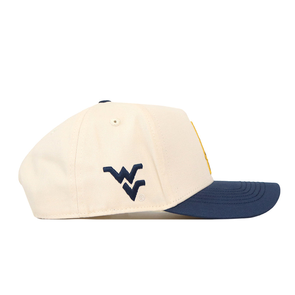 Side view of the No Rivals WVU Pat White’s No. 5 Hat - Classic Navy, featuring a cream-colored crown, a navy blue brim, and an officially licensed embroidered navy blue WV logo on the left side. Includes a convenient snapback adjustment for a comfortable fit.