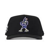 Introducing the Creighton Bluejays Baseball Hat by No Rivals—a black performance fabric cap featuring an embroidered cartoon Bluejay in a blue shirt on the front. The flat brim offers a modern look, while a white and blue patch with the letter “C” decorates the left side. An adjustable snap back closure ensures a comfortable fit.