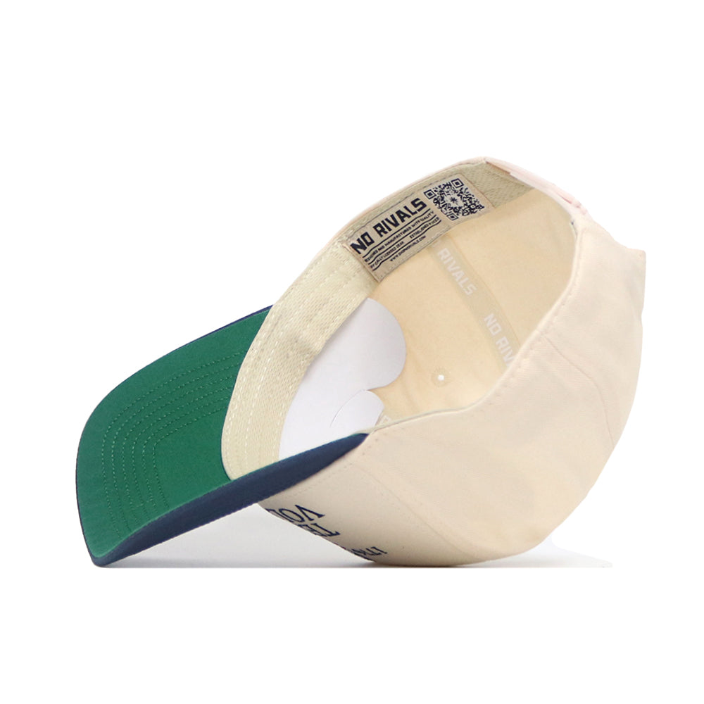 The Tennessee Vols 250th Americana Hat by No Rivals is shown on its side, displaying the inner label. It features a beige and green design, blue accents, a green bill, Snap Back closure, and an embroidered logo for standout gameday style.