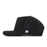 A side view of the No Rivals Washington Huskies Golf Hat in black, featuring small ventilation holes and a flat brim. The cap displays an embroidered NR logo on a rectangular patch on the side and is designed with a classic snap back closure for adjustable fit.