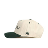 The Sunday Golf Hat - Classic Green by No Rivals features a cream snapback, dark green bill, "GOLF" in black on the front, a green NR logo on the side, and green eyelets—perfect for gameday style.