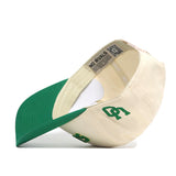 The Upside Down Ducks Hat - Oregon - Classic by No Rivals is a cream and green snapback with a structured fit, green brim, cream crown, side “SC” embroidery, visible inner “NO RIVALS” label, and crafted from high-quality cotton.