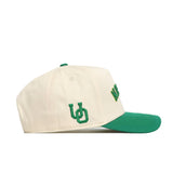 The Upside Down Oregon Hat - Classic by No Rivals is a cream Snap Back cap with a green brim, featuring green UD initials on the side and green-yellow logo embroidery on the front—ideal for your next gameday look.