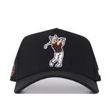 The No Rivals Texas State Golf Hat - Black features embroidered graphics of a cartoon wildcat in a maroon shirt and white pants swinging a golf club, plus a snap back adjustment for the perfect fit.