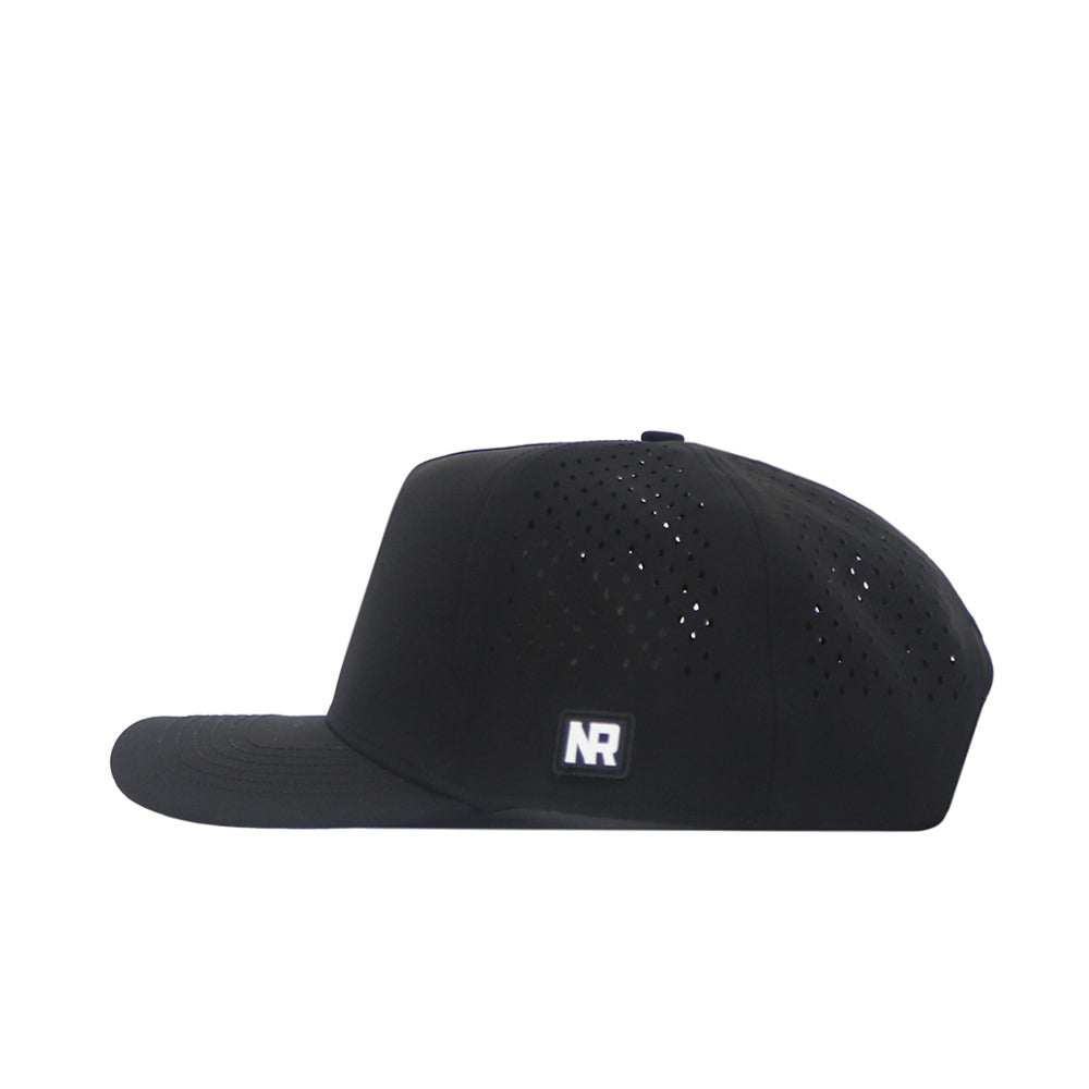 The No Rivals Texas State Golf Hat - Black is shown in profile. It features a flat brim, side ventilation holes, and a rectangular patch with white "NR" embroidery near the brim.