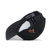 The No Rivals Texas State Golf Hat - Black is shown upside down, featuring a red and gold flame embroidery on the side, perforated ventilation holes, a curved brim, and branded details on the inner band.