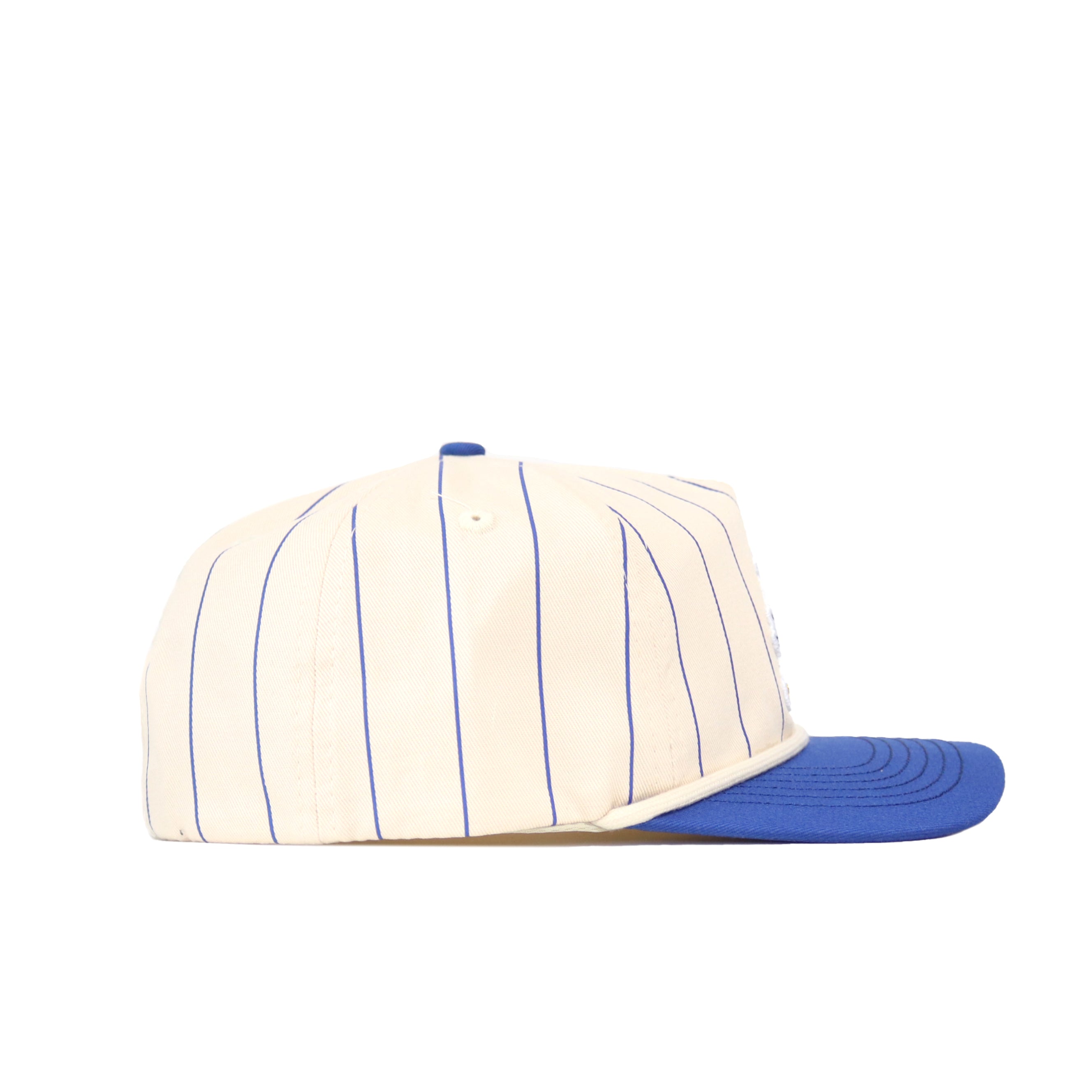 The No Rivals Kansas Pinstripe Hat features cream fabric with thin blue pinstripes, a solid blue brim, and an embroidered logo. Shown in side profile on a white background, this officially licensed snapback adds classic style to any outfit.