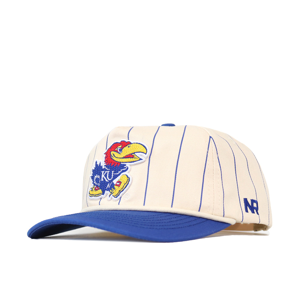 The Kansas Pinstripe Hat by No Rivals is a cream snapback cap with blue pinstripes, an official embroidered bird mascot, KU on the side, a blue bill, and NR stitched on the left.