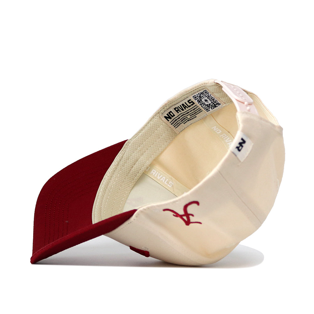 The Upside Down ALABAMA Hat by No Rivals is shown flipped to reveal its inside label with "NO RIVALS" and a QR code. This classic color cap features a red brim, structured fit, and an embroidered red "A" on the cream panel.