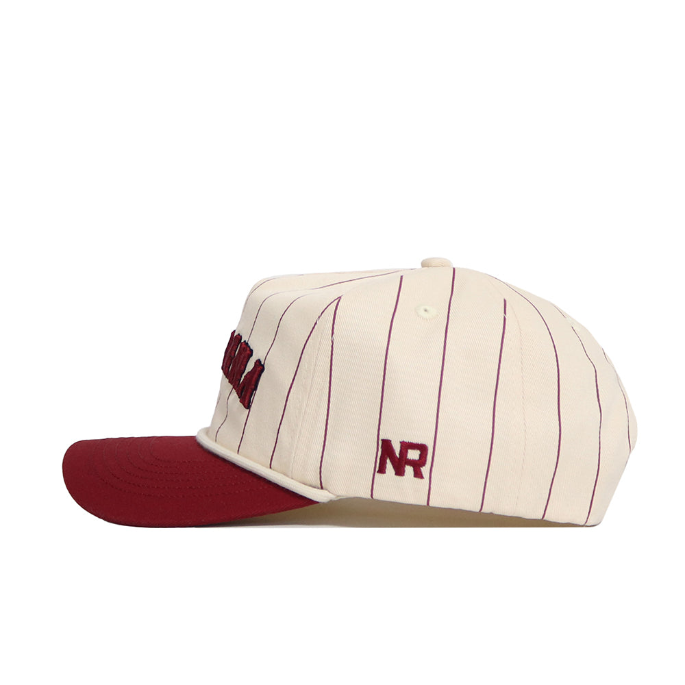 The No Rivals South Carolina Walk Off Hat is a cream cotton cap with thin burgundy pinstripes, a burgundy brim, and NR embroidered above the ear. This snapback features an unstructured fit for casual comfort.