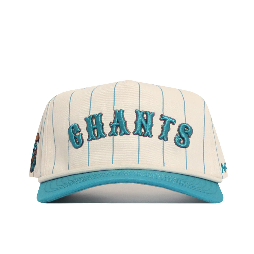 The No Rivals Coastal Carolina Walk Off Hat features cream cotton with thin blue stripes, a teal brim, and bold teal and brown CHANTS embroidery on the front. This adjustable snapback offers comfort and standout style.