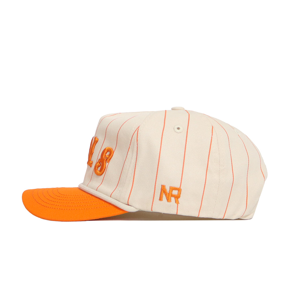 The Tennessee Walk Off Hat by No Rivals features a cream cotton design with thin orange pinstripes, an orange bill, orange embroidered details on the front, NR initials on the side, and an unstructured fit for a relaxed look.