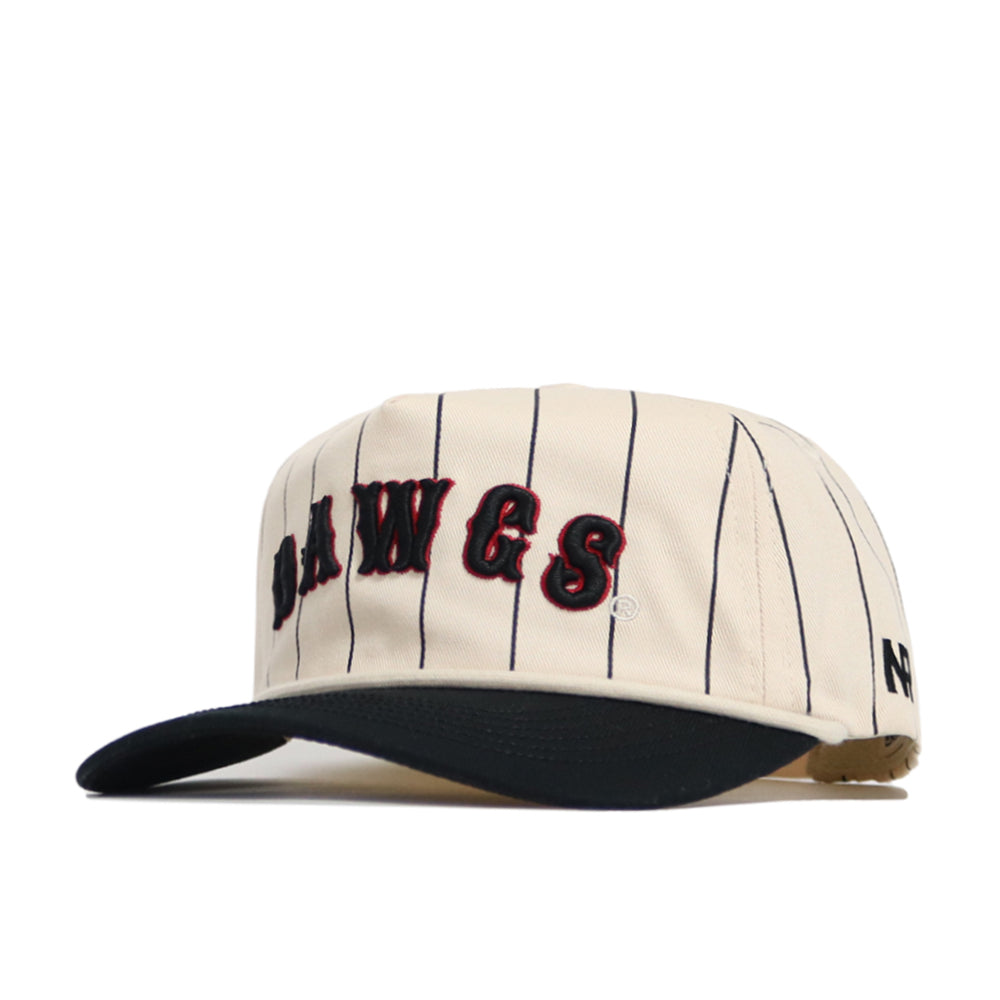 The No Rivals Georgia Walk Off Hat features cream cotton with black pinstripes, a black bill, bold "DAWGS" embroidery in black/red on front, an unstructured snapback fit, and a small black N logo on the side.