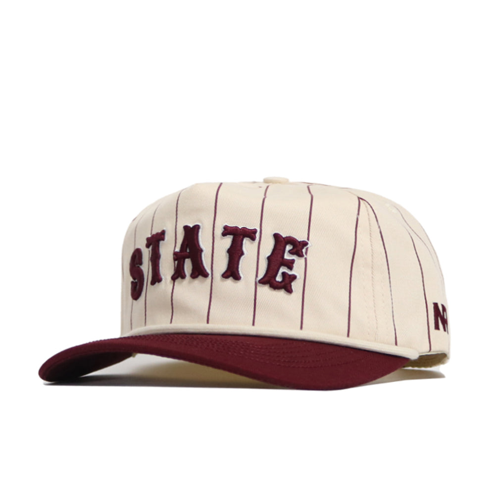 The No Rivals Mississippi State Walk Off Hat features a cream base with thin maroon stripes, a maroon brim, and STATE in bold maroon letters. Made of premium cotton with an unstructured, comfortable fit.