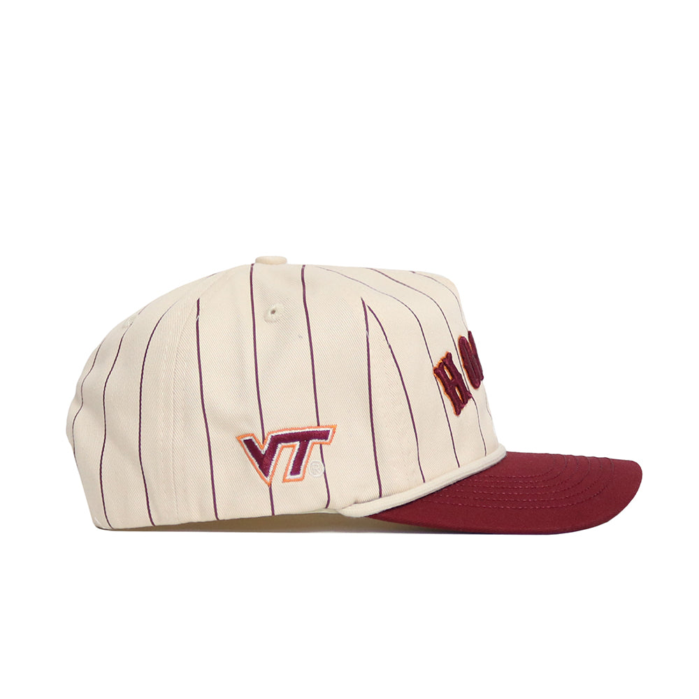The No Rivals Virginia Tech Walk Off Hat is a cream baseball cap with thin maroon stripes, a maroon brim, and the VT logo in maroon and orange. Made from cotton with an unstructured fit and a snap back closure. Front lettering is partially visible.