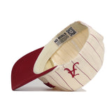 The Alabama Walk Off Hat by No Rivals is a cream adjustable snapback with red pinstripes, a red brim, and a red embroidered V logo on the front. The inside label says "NO RIVALS." The hat is shown lying on its side.