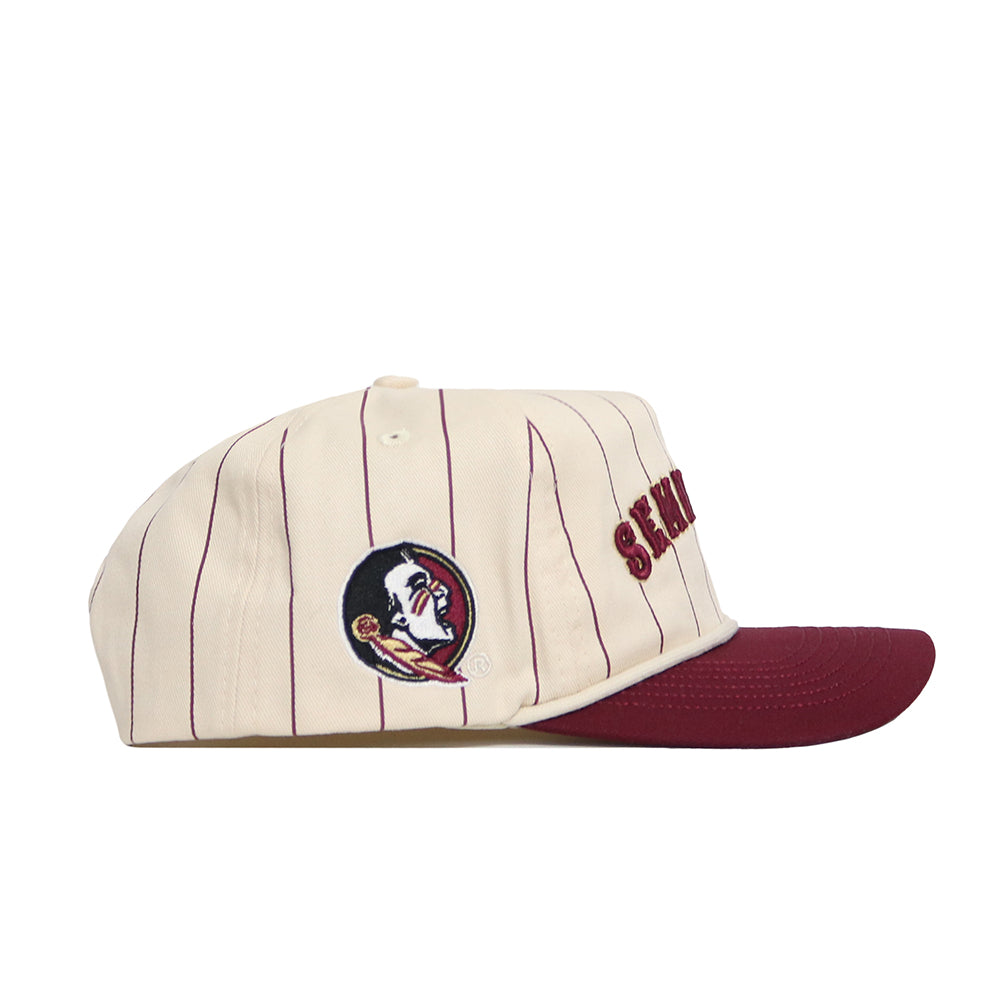 The Florida State Walk Off Hat by No Rivals features cream cotton with maroon stripes, a maroon brim, SEMINOLES embroidered on the side, a Native American profile logo, and an unstructured fit for relaxed comfort.