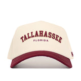 The No Rivals Tallahassee Hometown Hat is a cream snapback with a maroon brim, embroidered "TALLAHASSEE FLORIDA" on the front, and crafted from cotton for a comfortable, structured fit.