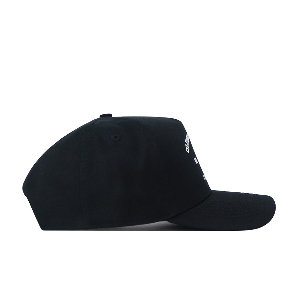 The No Rivals Clemson Outlaw Hat in black is displayed in a side profile view against a white background. Boasting a classic, simple design with a curved brim and easy snapback adjustment, this hat provides the perfect gameday fit for any occasion.
