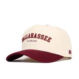 The No Rivals Tallahassee Hometown Hat is a cream snapback with a maroon brim, featuring "TALLAHASSEE FLORIDA" embroidered in maroon on the front and a maroon N logo on the side. Made from comfortable cotton fabric.