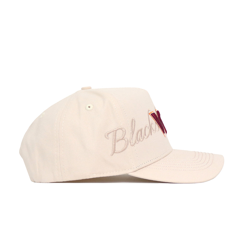 The Virginia Tech Stacked Hat by No Rivals is a beige cotton baseball cap with a structured fit, shown from the side, featuring "Black" in light brown embroidery and a red K overlaid on the front panel.