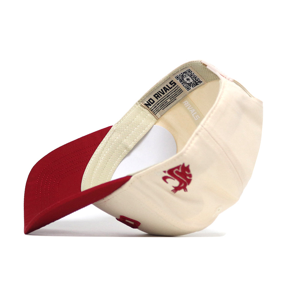 The Right Side Up Cougars Hat by No Rivals features a beige and red snapback design, a red underside on the visor, an embroidered cougar logo on the side, and “NO RIVALS” text on the inner band for a standout game day look.