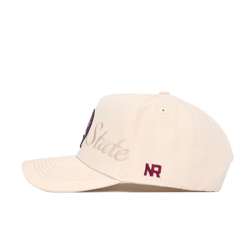 The No Rivals Florida State Stacked Hat is a beige snapback cap made of high quality cotton, featuring "State" embroidered in cursive on the side and "NR" stitched in maroon near the back. It has a curved brim, structured fit, and visible top stitching.
