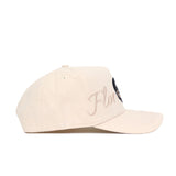 The Florida State Stacked Hat by No Rivals is a beige, structured cotton baseball cap, shown in side view. "Flor" is embroidered in cursive on the front panel with a partially visible design also featured on the front.