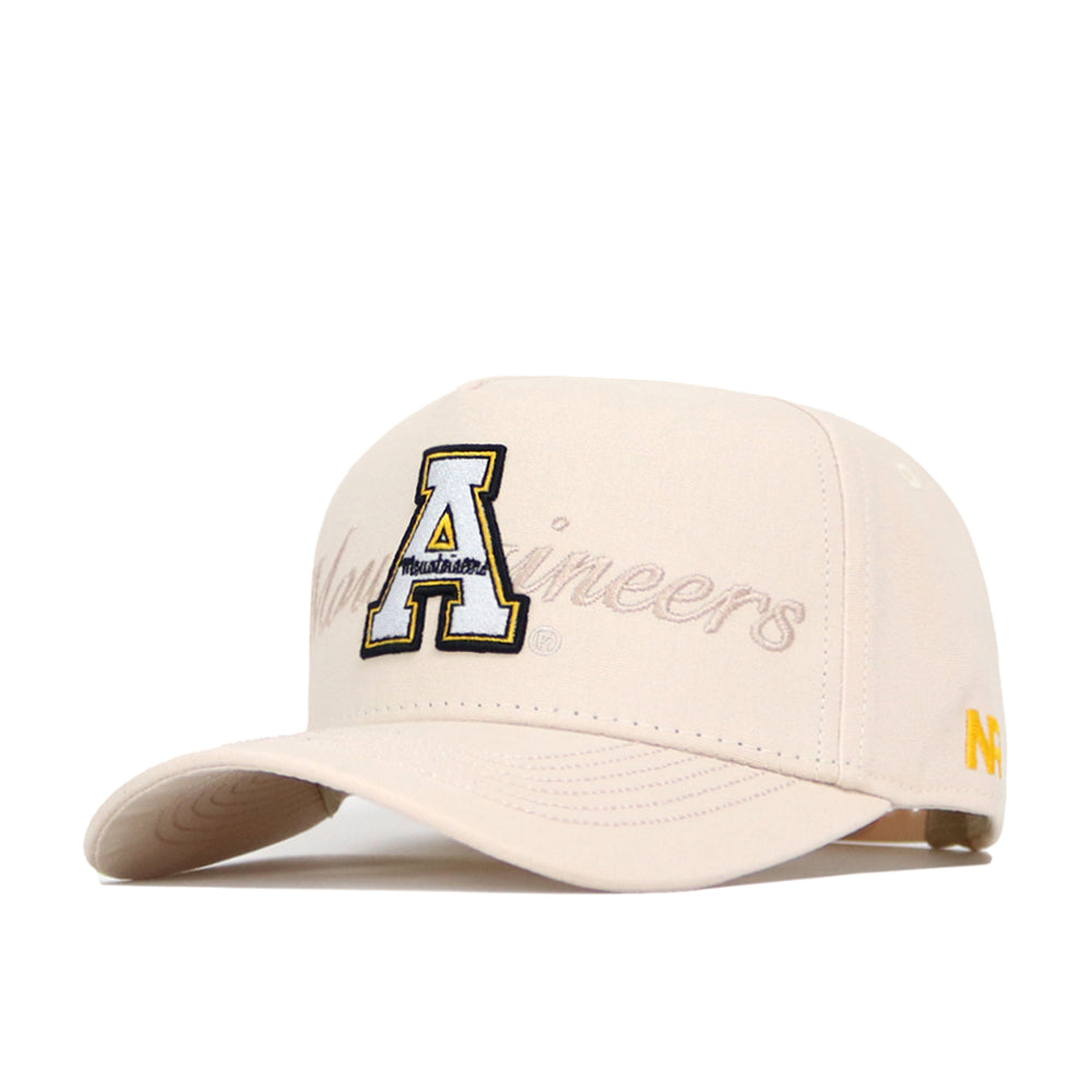 The No Rivals App State Stacked Hat is a beige cotton baseball cap with a large embroidered letter A and "Mountaineers" scripted on the front, plus yellow N and E embroidery on the left side.