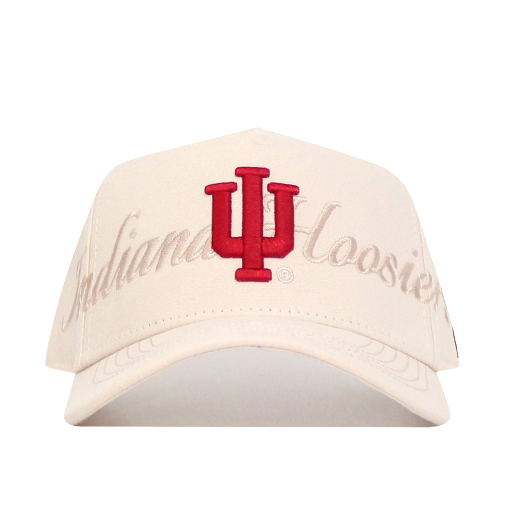 The Indiana Stacked Hat by No Rivals is an officially licensed cream snapback featuring a red IU logo and "Indiana Hoosiers" embroidered in light beige script on a high-quality cotton front panel.