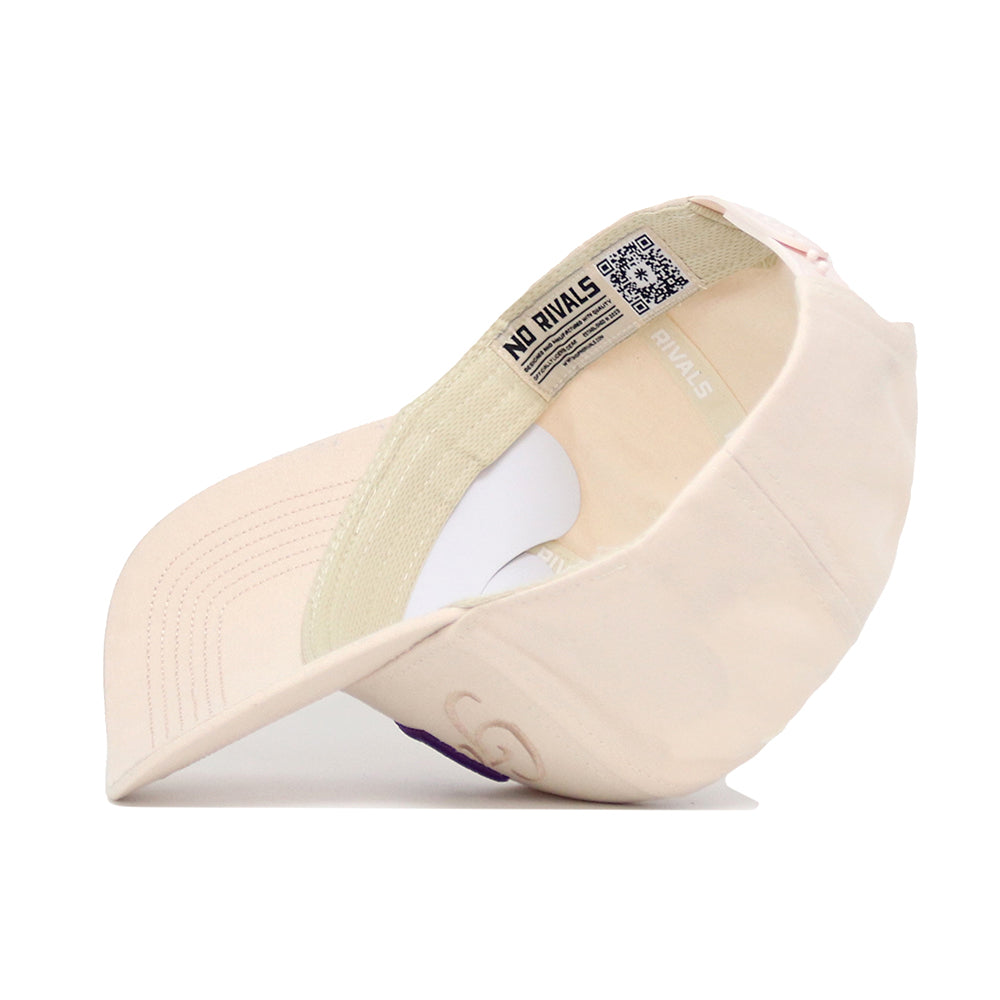 The No Rivals LSU Stacked Hat, shown inside out, displays its inner tags, stitching, and a NO RIVALS QR code label. The structured visor faces left while the light beige cotton crown appears slightly misshapen.