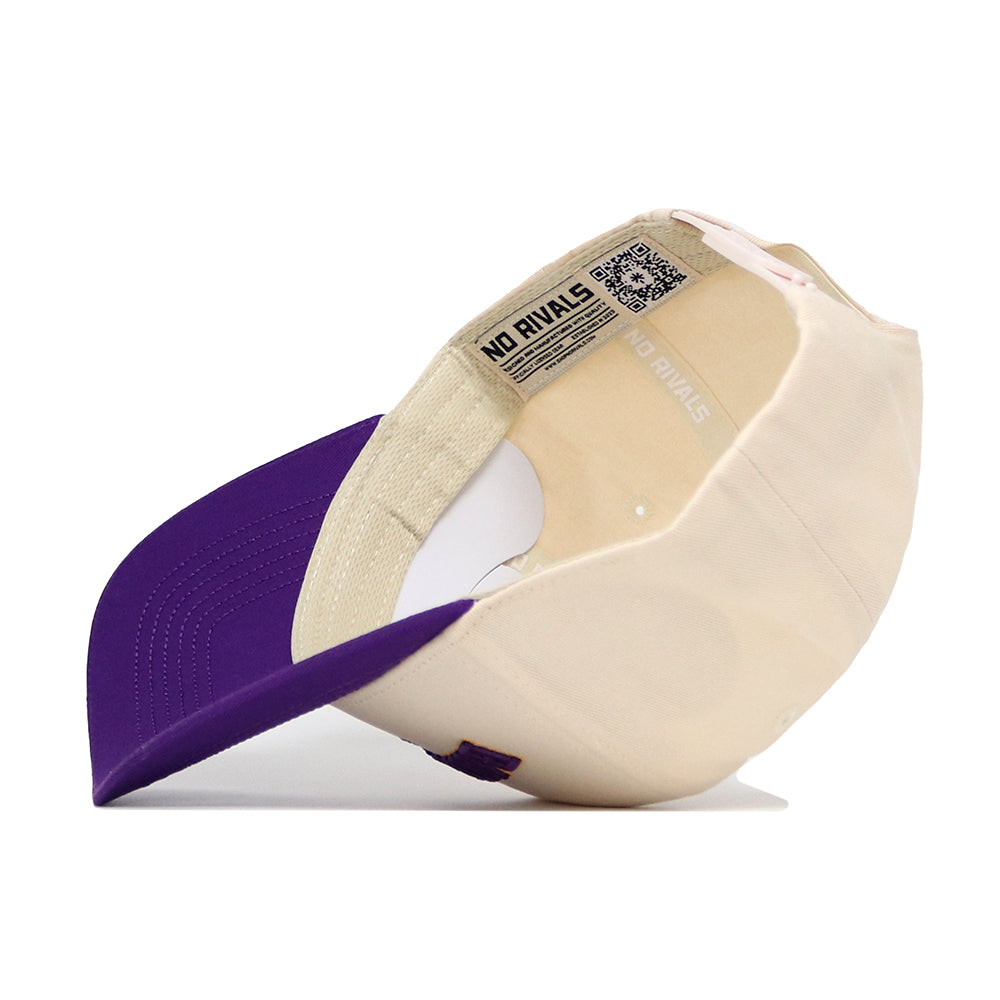 The Baton Rouge Hometown Hat by No Rivals is a beige and purple snapback, shown from below to reveal its inner lining, a No Rivals label, and a QR code under the brim.