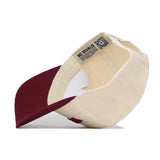 The Tuscaloosa Hometown Hat by No Rivals features a cream and maroon snapback design, cotton fabric for comfort and structure, an inside label reading NO RIVALS, and a QR code near the adjustable strap.
