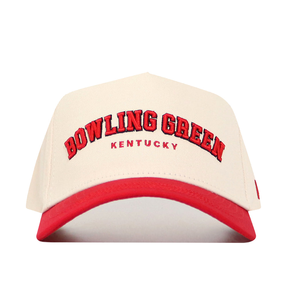 The Bowling Green Hometown Hat by No Rivals features a beige cotton build, red brim, and red embroidered "BOWLING GREEN KENTUCKY" text on the front in a structured baseball cap design.
