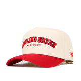 The Bowling Green Hometown Hat by No Rivals is a beige structured fit cap with "Bowling Green Kentucky" in red on the front, a red curved brim, side logo, and adjustable snap back. Crafted from high quality cotton for comfort and style.