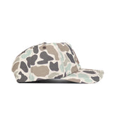 A side view of the No Rivals Arizona Huntsman Hat, a 5-panel cap in beige, brown, gray, and light green duck camo with a curved brim, snapback closure, and visible stitching.