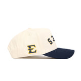The No Rivals Upside Down BUCS Hat - ETSU - Classic Colors features a cream crown, navy brim, high-quality cotton, bold yellow and navy E logo on the side, and S A in navy on the front for a structured fit.