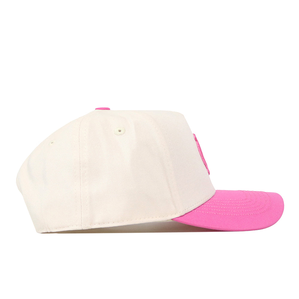 Introducing the No Rivals North Carolina Pink Out Hat—a white baseball cap featuring a pink brim and matching pink button on top, displayed from the side against a white background. Its snapback design ensures you can easily find your perfect fit.
