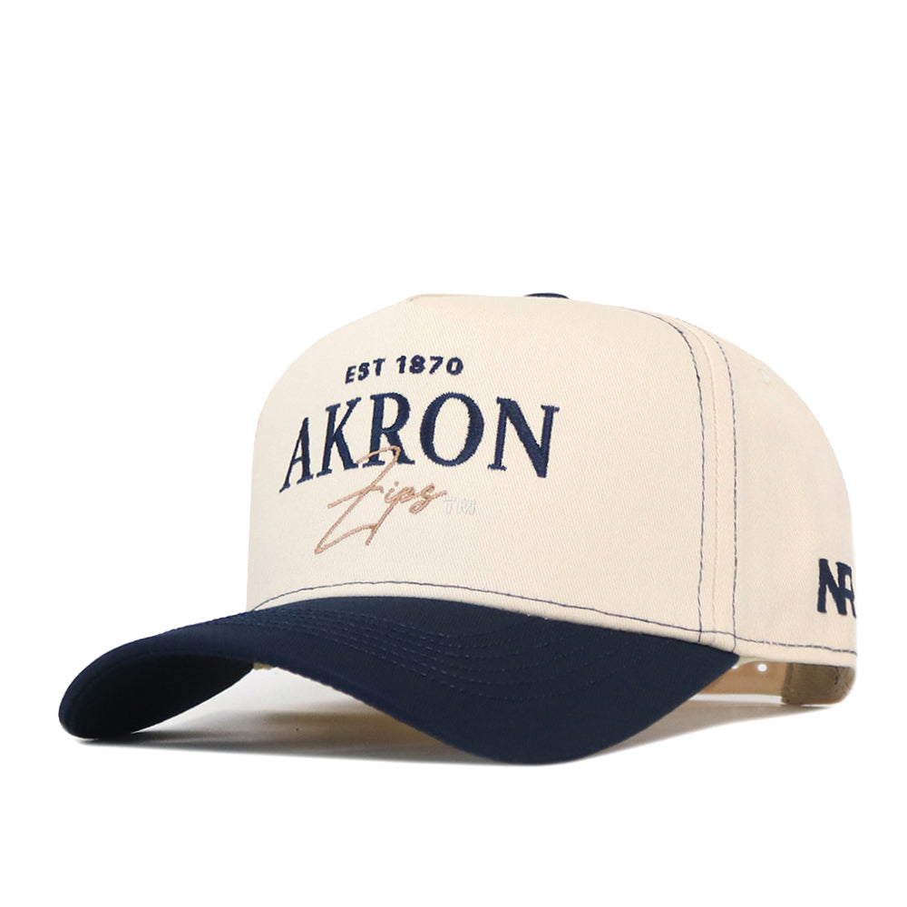 Akron Zips Vintage Hat in cream with a dark blue brim, featuring embroidered EST 1870 AKRON Zips text and a gameday fit logo on the side.