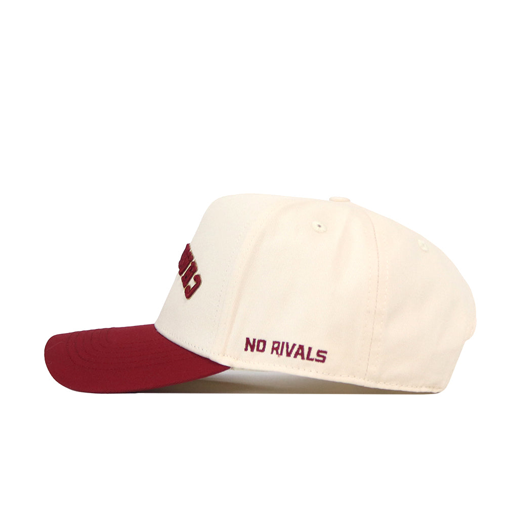 The No Rivals College of Charleston Upside Down Charleston Hat - Classic features a white baseball cap with a maroon brim. “NO RIVALS” is embroidered in maroon on the side, and the hat includes a classic snapback closure for an adjustable fit.