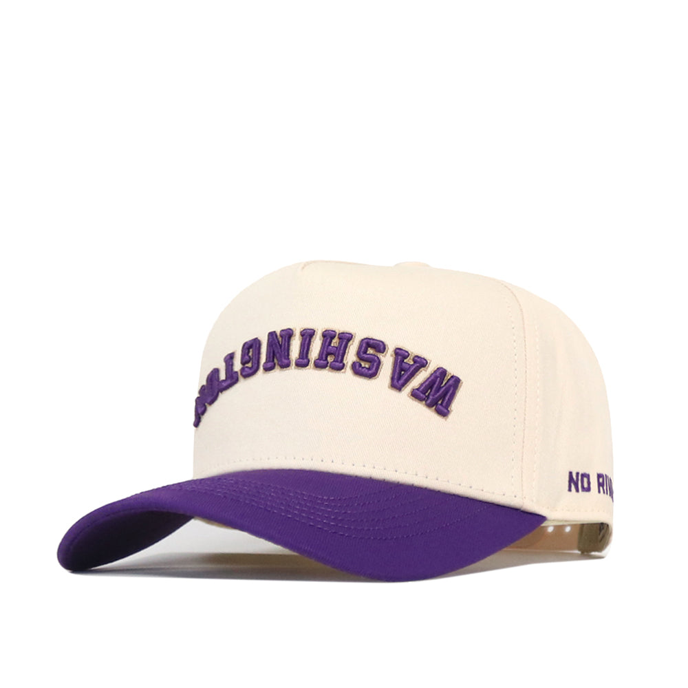 Introducing the Washington Huskies Upside Down Washington Hat - Classic by No Rivals. This white snapback cap features a bold purple brim, with “WASHINGTON” embroidered upside down in striking purple letters across the front and “NO RIN” stitched in purple on the side of the brim. Designed for standout style and a customizable fit, this adjustable hat is perfect for any Huskies fan.