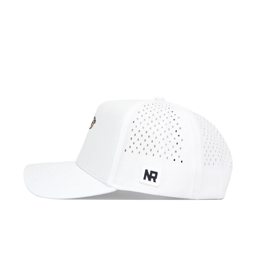 Side view of the Mizzou Golf Hat - Swinging by No Rivals, in white. Features small side ventilation holes, a black NR logo patch near the brim, and a structured fit. Made from a polyester-cotton blend, shown against a plain white background.