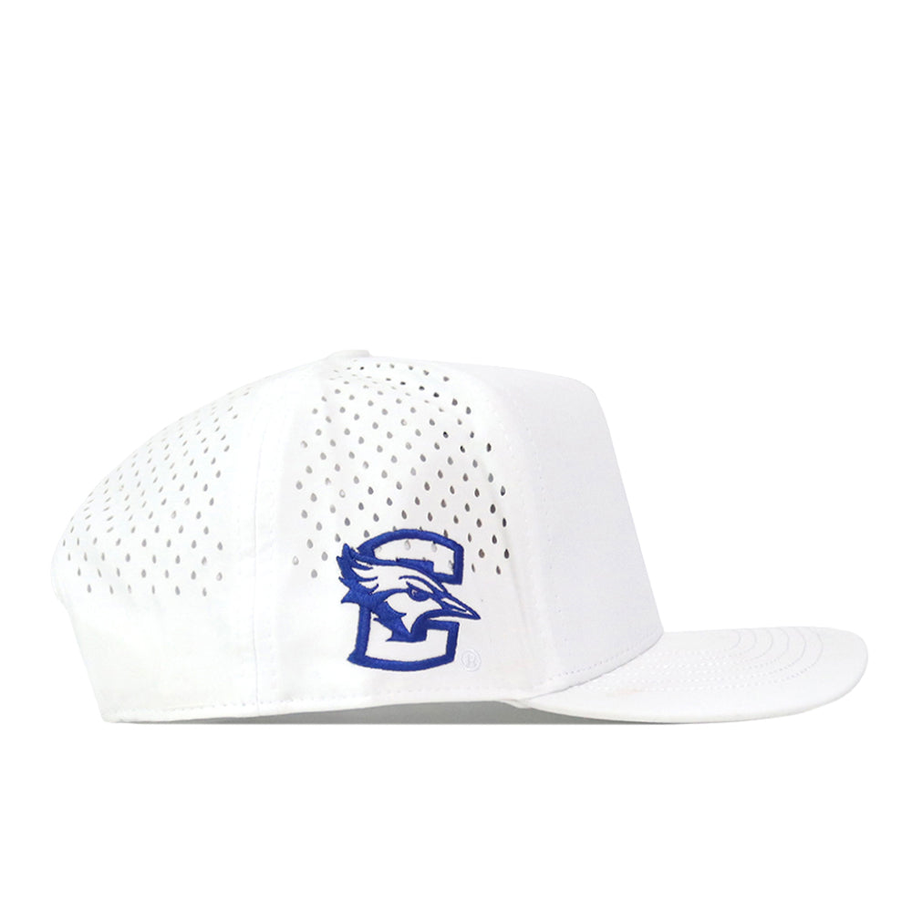 Show your team spirit with the No Rivals Creighton Bluejays Golf Hat in White. This snapback cap features a breathable white mesh back, a flat bill, and ventilation holes throughout for ultimate comfort and style. The side is adorned with an eye-catching blue and white embroidered Bluejays logo, while the convenient Snap Back Adjustment lets you achieve your perfect Gameday Fit every time.